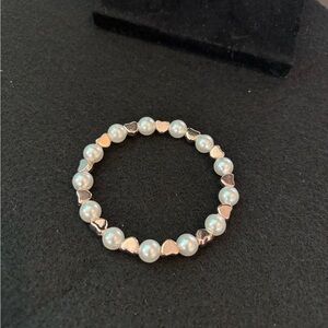 Gold and White Pearl Bracelet with Elegant Design